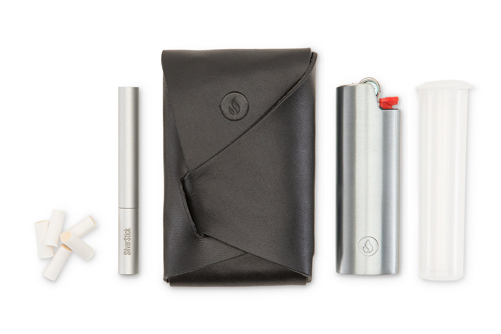 Leather dugout with pipe, lighter, container, and poker